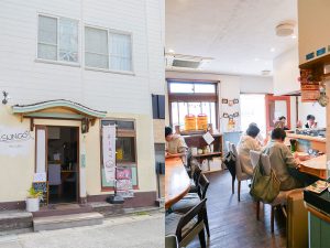 駅の改札を出て左。少し登った場所にある。店内はキッチンを囲むカウンター席が。昼は日差しが入り明るい雰囲気